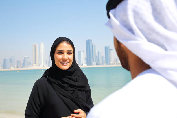 istock Emirati couple in the Beach 644276408