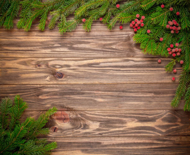 istock Christmas fir tree on wooden background 644292476