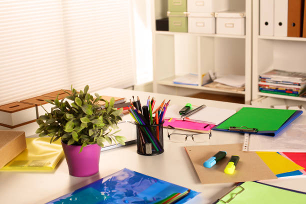 istock Office workplace with laptop and glasses on wood table 644300602