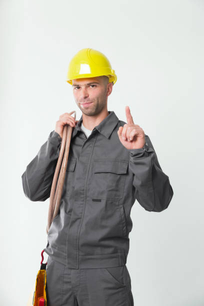 istock Electrician Wearing Protective Workwear For Safety Work 644305034