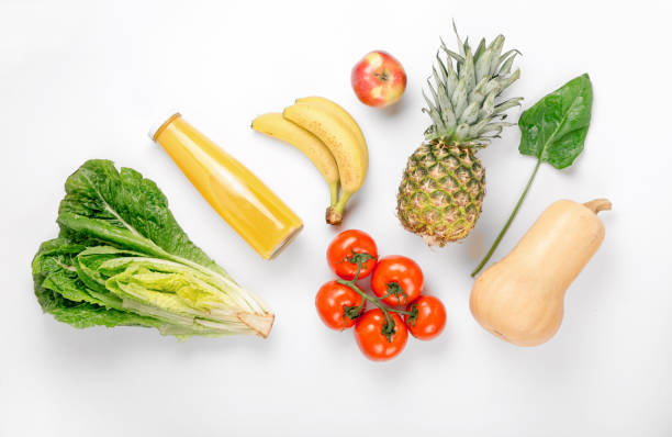 establecer diferentes alimentos sanos sobre un fondo blanco - vegetable basket fotografías e imágenes de stock