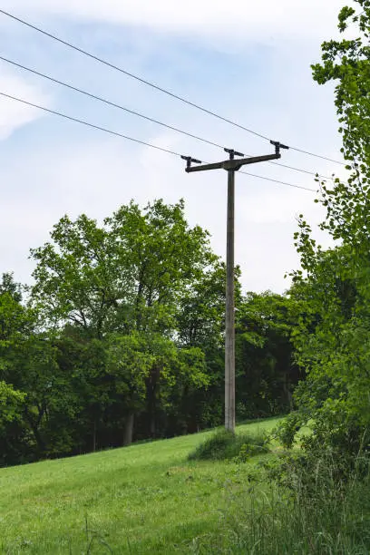 single electricity pylon in the nature
