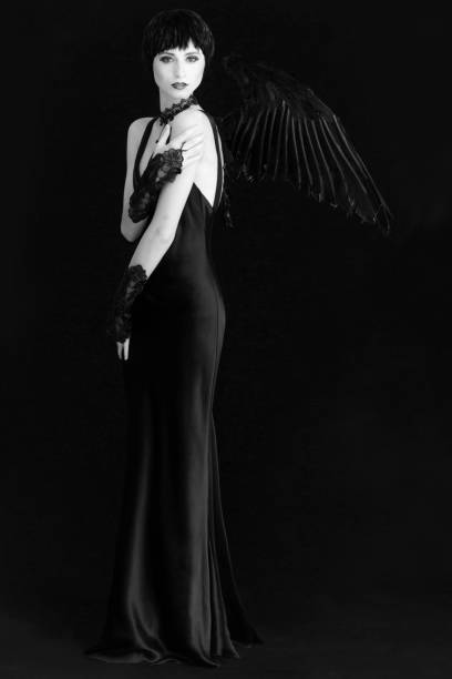 istock Woman in Black with Black Wings 644371962