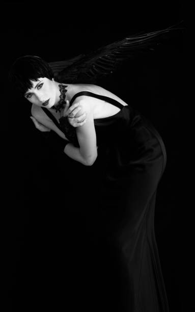 istock Woman in Black with Black Wings 644372000