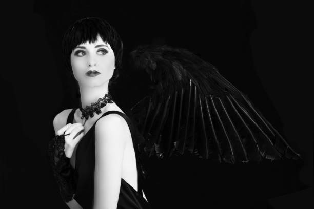 istock Woman in Black with Black Wings 644372040