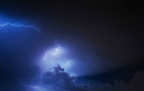 istock Lightning strike on the cloudy dark sky. Fantastic summer night 644376856