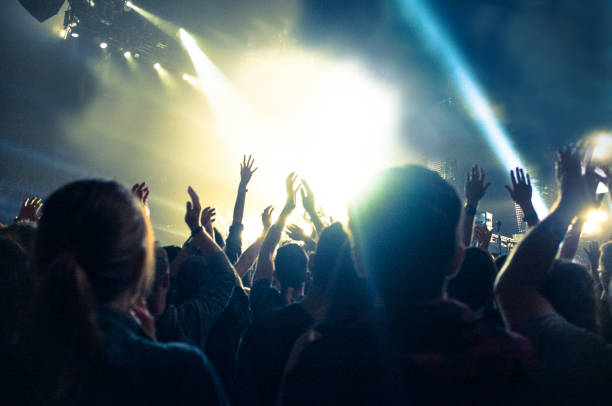 istock Concert crowd, hands in the air 644383148