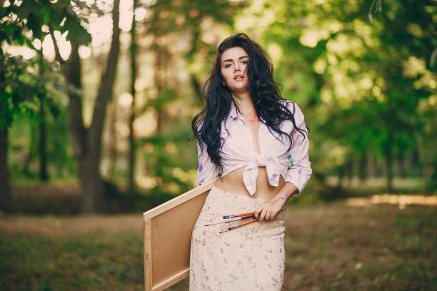 istock Artist girl in park 644389262