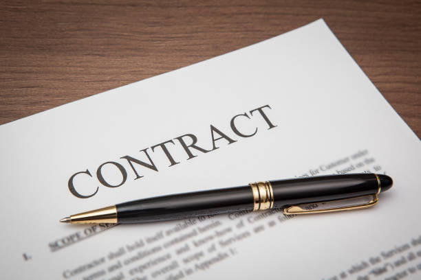 istock close up of contract document and pencil in office 644394038