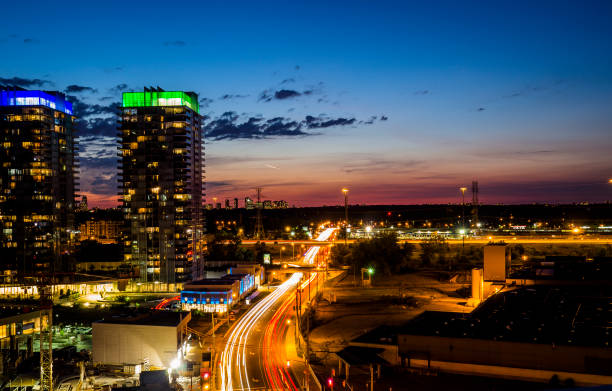 istock Urban skyline with traffic in motion 644404092