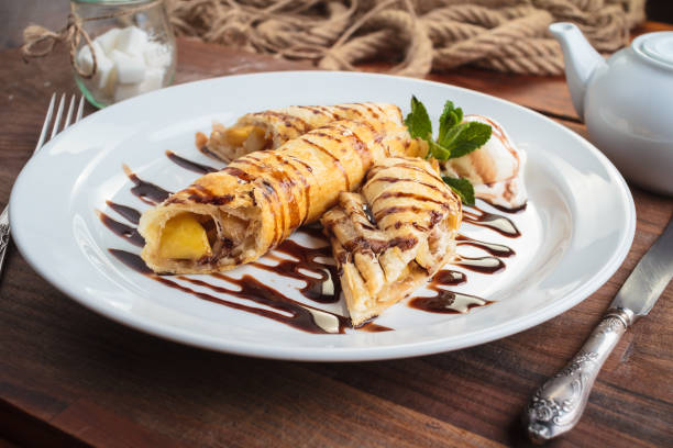 istock Strudel with apple on vintage wooden table. 644417674