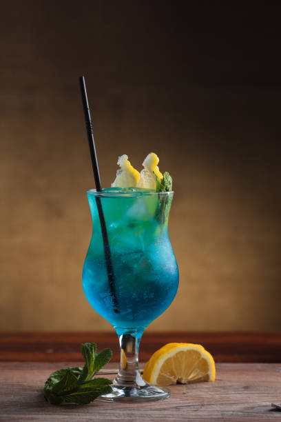 istock Blue Lagoon Cocktail on gritty vintage background. 644424906