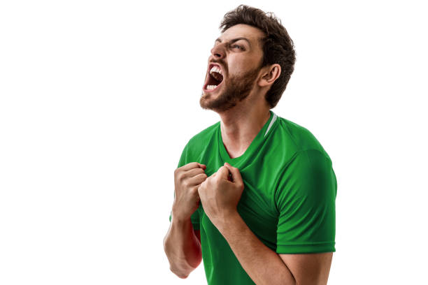 istock Fan / Sport Player on green uniform celebrating on white background 644425764