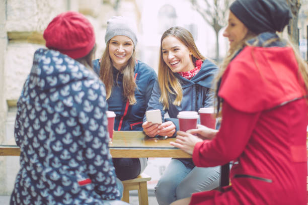 istock Young women are having fun in a coffee shop 644431134