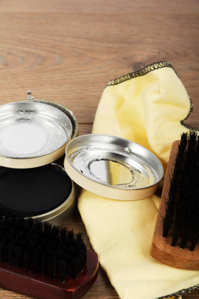 istock Shoe polishig equipment on a wooden floor 644446476