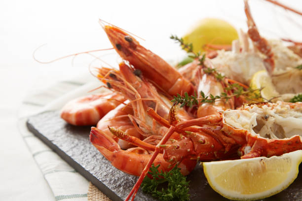 istock boiled shrimps on black stone plate 644452600