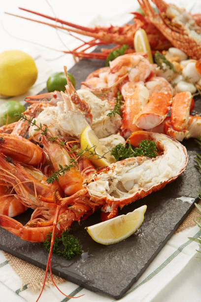 istock boiled shrimps on black stone plate 644452606