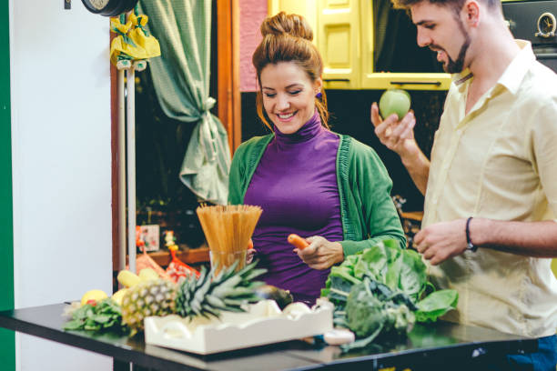 istock Young couple cooking in the kitchen 644453534