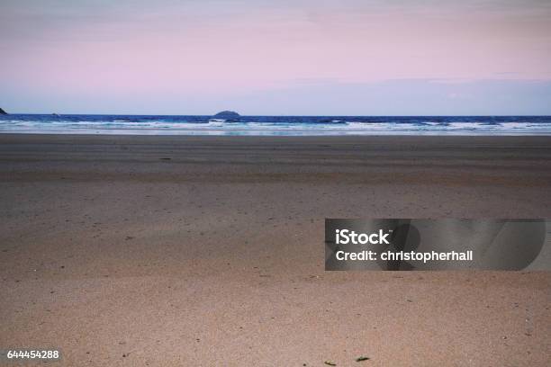 Early Morning View Over The Beach At Polzeath Vintage Retro Filter Stock Photo - Download Image Now