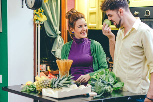 istock Young couple cooking in the kitchen 644456612