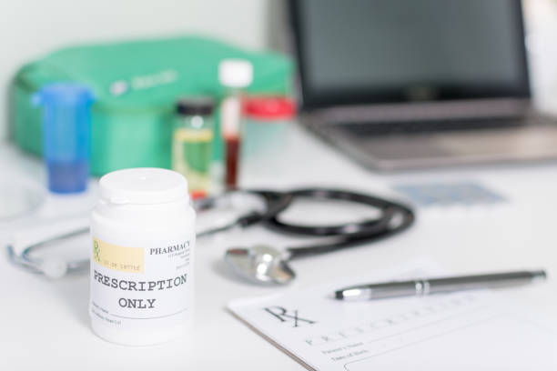 istock Pill bottle on a doctor's desk with Prescription only 644474942