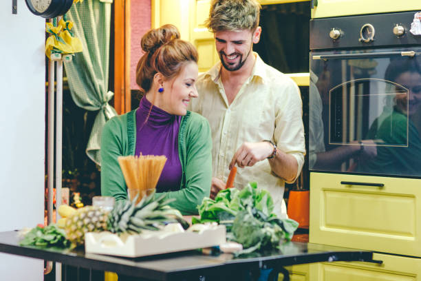 istock Young couple cooking in the kitchen 644503338