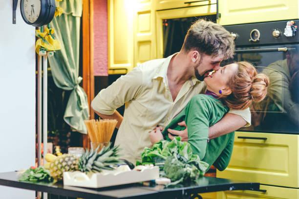 istock Young couple cooking in the kitchen 644506152