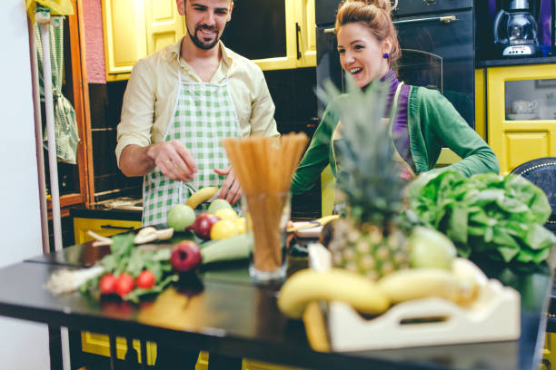 istock Preparing food at the kitchen 644538296