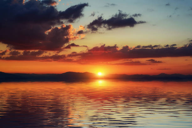 istock Sunset over the sea, the coast. 644569316