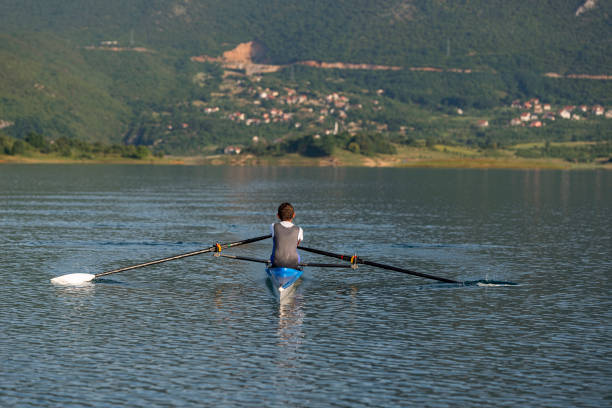 istock Child in the course of rowing on single 644587188