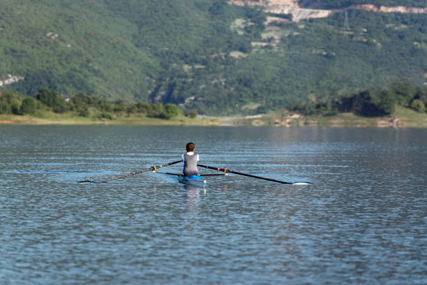 istock Child in the course of rowing on single 644598630