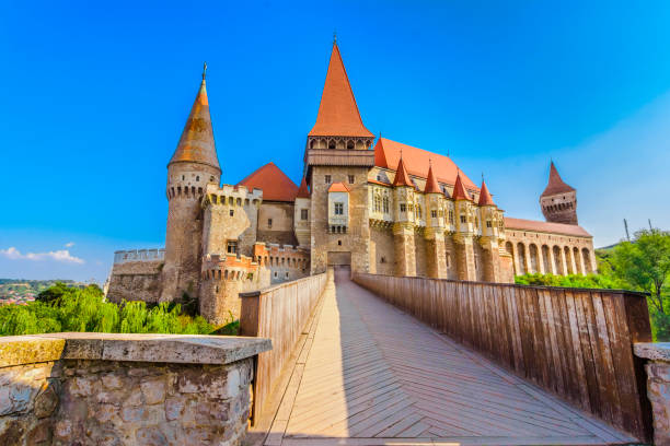Corvin Castle in Hunedoara, Romania The Corvin Castle or Corvinesti Castle is situated on a higher hill in Hunedoara, Romania. The construction of this castle begun in the 14th century and changes were made until 16th century. hunyad castle stock pictures, royalty-free photos & images