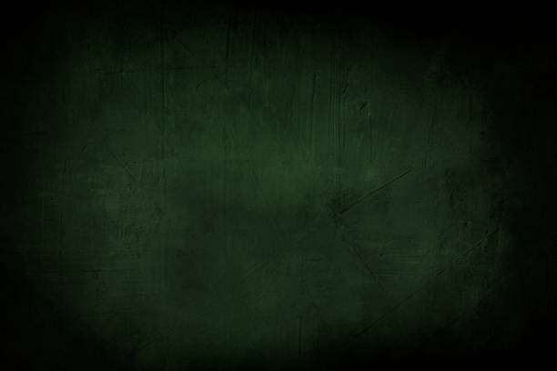 istock dark green grunge background or texture with black vignette borders 644606346