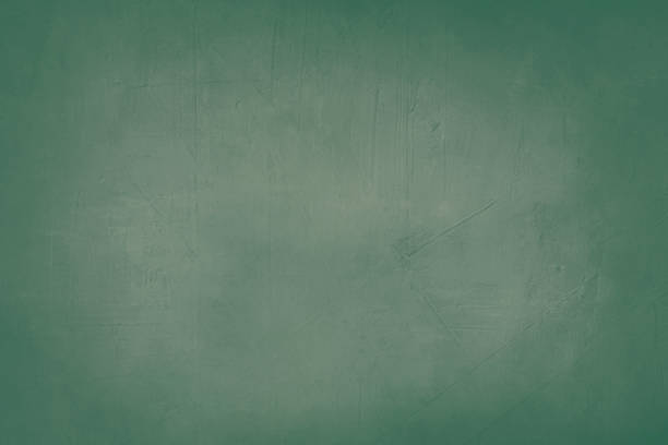 istock pale green grunge background or texture with black vignette borders 644606392