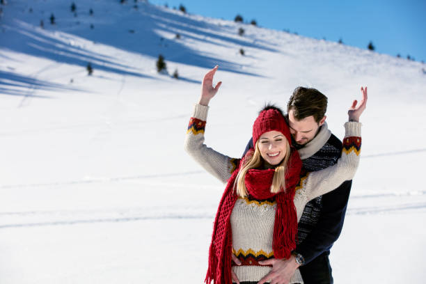 istock Happy Couple Having Fun on snow mountain. 644630278