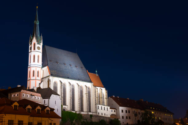istock Cesky Krumlov old bohemia church at night 644636414