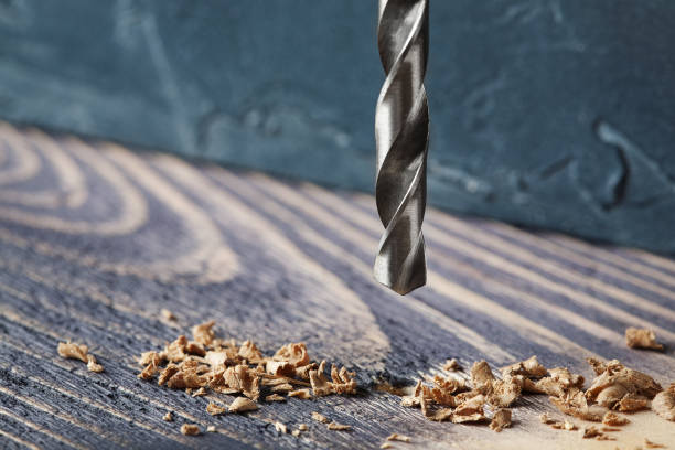 istock metal drill bit make holes in wooden oaks plank 644666604