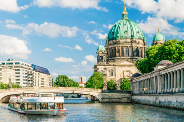 istock Berlin Cathedral at famous Museum Island with excursion boat river 644666662