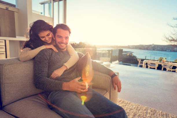 istock Couple on the sofa in the morning. 644682204