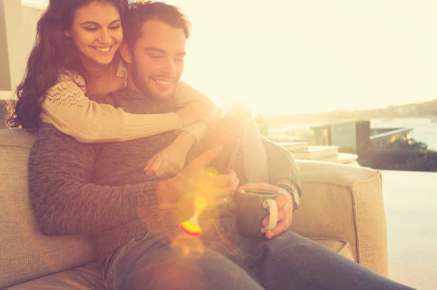 istock Couple on the sofa in the morning. 644682236