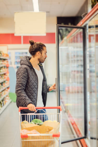 istock Young Man Groceries Shopping 644706794
