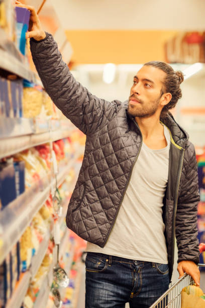 istock Young Man Groceries Shopping 644706964