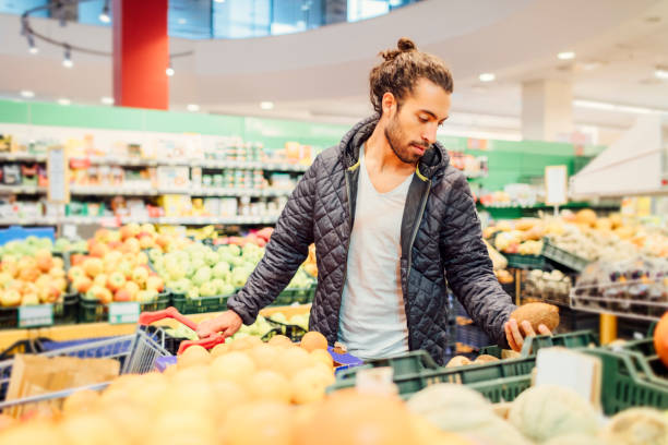 istock Young Man Groceries Shopping 644715288