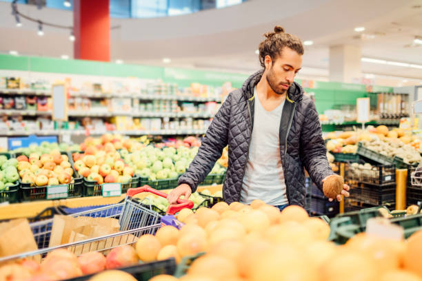 istock Young Man Groceries Shopping 644716060