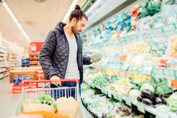 istock Young Man Groceries Shopping 644716198