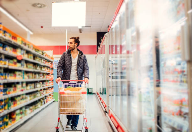 istock Young Man Groceries Shopping 644717102