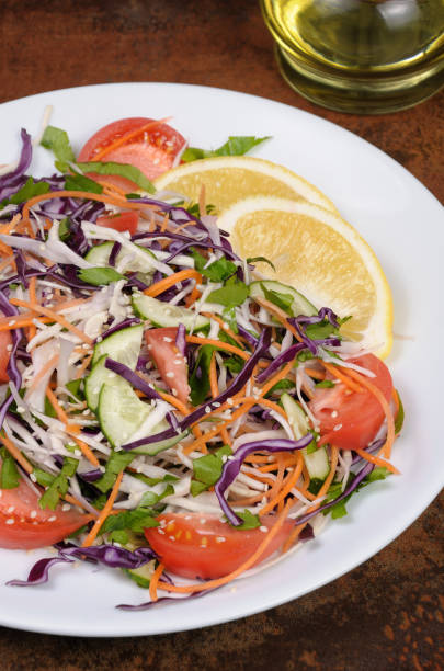 istock Salad of white and blue chopped cabbage, 644717656