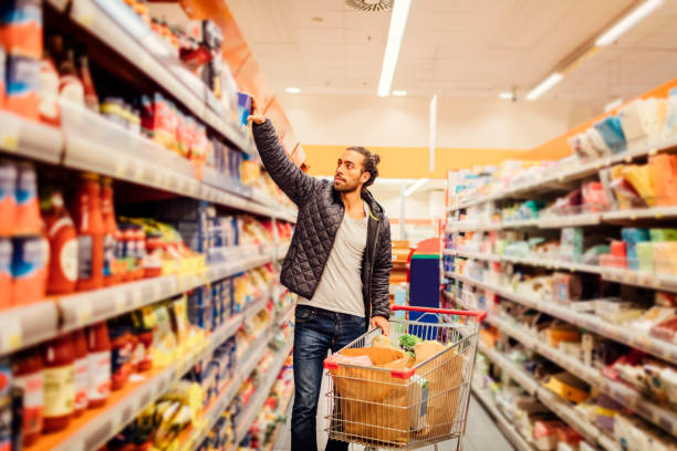 istock Young Man Groceries Shopping 644718014