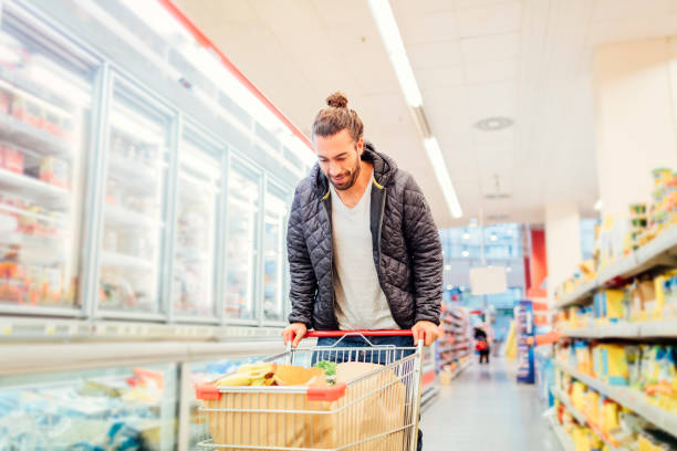 istock Young Man Groceries Shopping 644726504