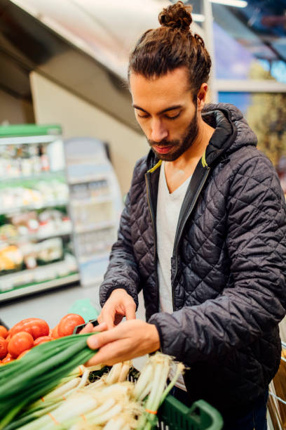 istock Young Man Groceries Shopping 644726960